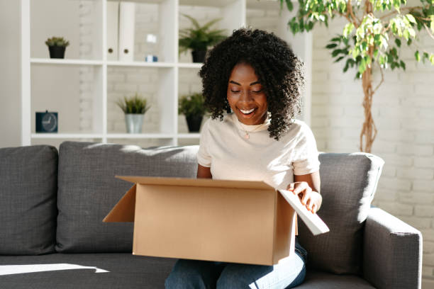 Woman opening package